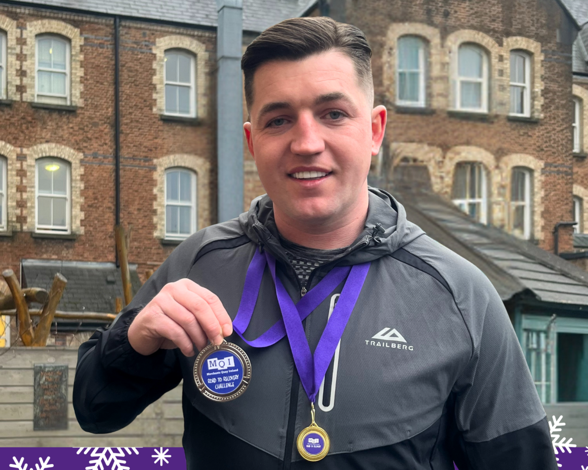 Rhys Moran, at High Park holding his 80km challenge medal. Road to Recovery